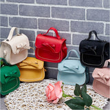 キッズ ポシェット 女の子 通販 ミニバッグ ミニバック シュルダーバッグ ショルダーバック リボン りぼん バッグ バック かばん 斜め掛け 肩掛け 小銭入れ 可愛い かわいい 子供