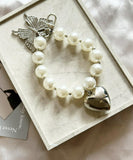 バッグチャーム 大人 おしゃれ 通販 キーチャーム スマホハンドストラップ バックチャーム キーホルダー ストラップ スマホ 手首 可愛い パール かわいい オシャレ ハート 蝶々 キラキラ