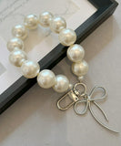 バッグチャーム 大人 おしゃれ 通販 キーチャーム スマホハンドストラップ バックチャーム キーホルダー ストラップ スマホ 手首 可愛い パール かわいい オシャレ リボン キラキラ 女性