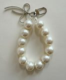 バッグチャーム 大人 おしゃれ 通販 キーチャーム スマホハンドストラップ バックチャーム キーホルダー ストラップ スマホ 手首 可愛い パール かわいい オシャレ リボン キラキラ 女性