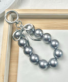 バッグチャーム 大人 おしゃれ 通販 キーチャーム スマホハンドストラップ バックチャーム キーホルダー ストラップ スマホ 手首 かわいい パール 可愛い オシャレ リボン キラキラ 女性