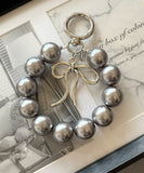 バッグチャーム 大人 おしゃれ 通販 キーチャーム スマホハンドストラップ バックチャーム キーホルダー ストラップ スマホ 手首 かわいい パール 可愛い オシャレ リボン キラキラ 女性