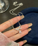 ネックレス レディース シルバー シンプル 通販 ペンダント 首飾り ジュエリー アクセサリー しずく 雫 大人 かわいい おしゃれ 可愛い オシャレ 女性 リボンティアドロップネックレス