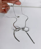 ネックレス レディース シルバー 通販 ペンダント スネークチェーン 首飾り アクセサリー ジュエリー リボン 大人 かわいい おしゃれ 可愛い 女性 リボンスネークチェーンネックレス