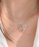 ネックレス レディース シルバー 通販 ペンダント 首飾り アクセサリー ジュエリー リボン シンプル 大人 かわいい おしゃれ 可愛い オシャレ 女性 アシンメトリーリボンネックレス