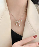 ネックレス レディース シルバー 通販 ペンダント 首飾り アクセサリー ジュエリー リボン シンプル 大人 かわいい おしゃれ 可愛い オシャレ 女性 アシンメトリーリボンネックレス