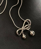 ネックレス レディース シルバー 通販 ペンダント 首飾り アクセサリー ジュエリー リボン シンプル 大人 かわいい おしゃれ 可愛い オシャレ 女性 アシンメトリーリボンネックレス