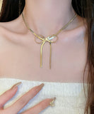 ネックレス レディース シンプル 通販 ペンダント スネークチェーン 首飾り ジュエリー アクセサリー リボン 大人 かわいい おしゃれ 可愛い オシャレ 女性 リボンモチーフネックレス